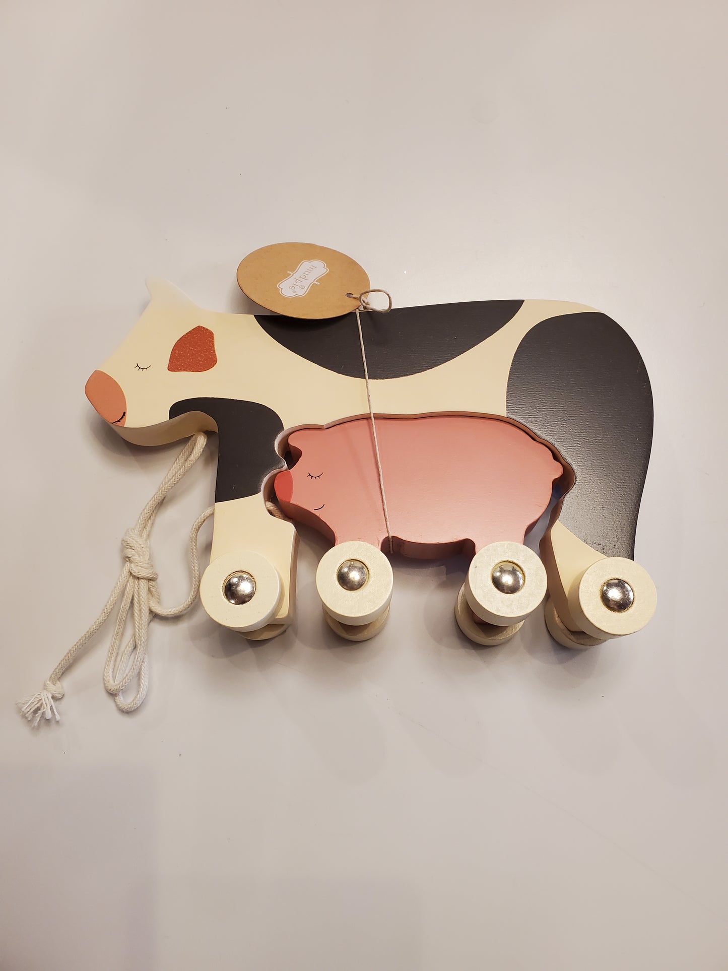 Cow rolling wood toy